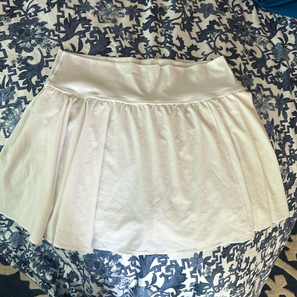 Aeries offline skirt. Worn 2x. Washed separately and line dried. Bright white.
